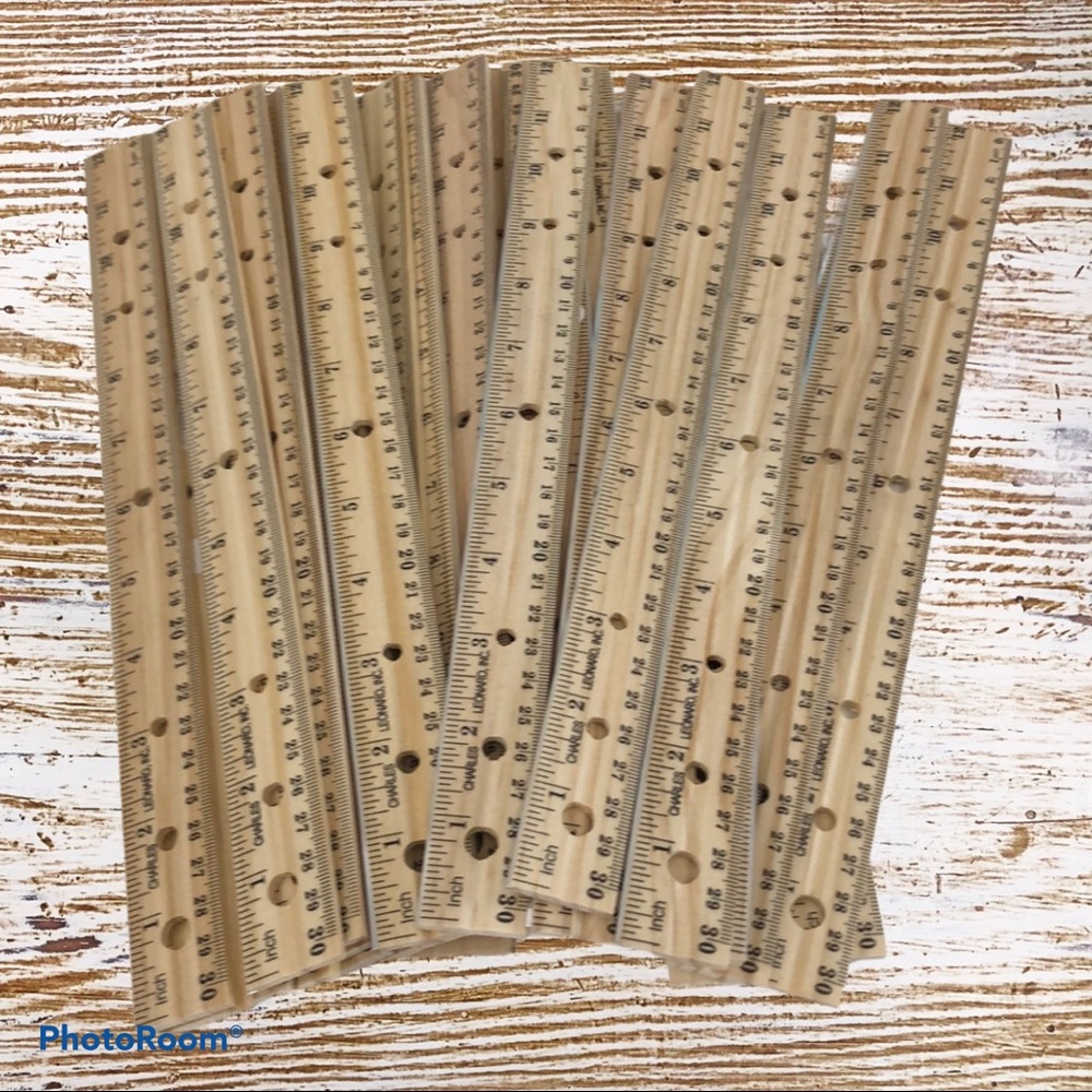 NEW. Set of 30 wooden rulers with metal edge.